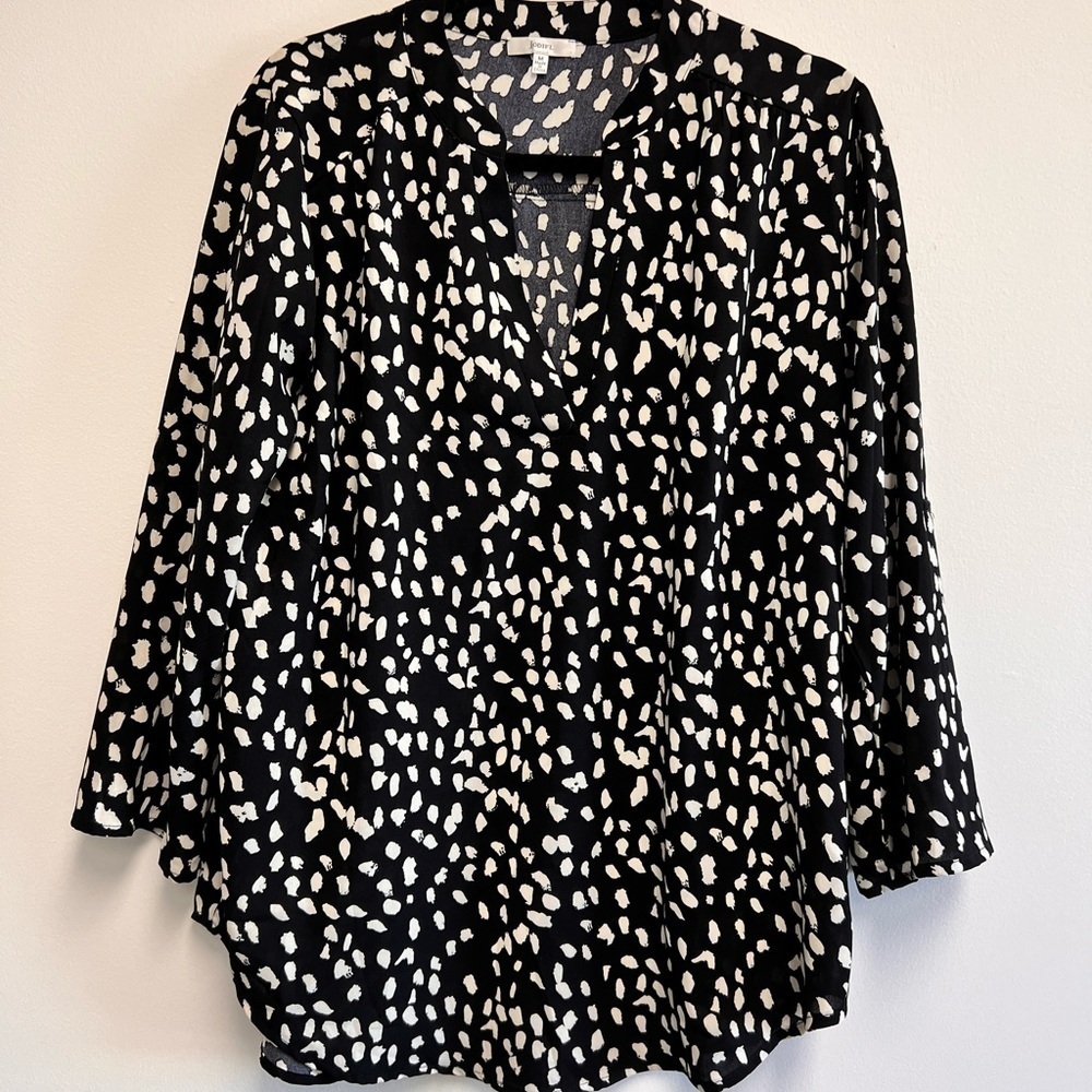 JODIFL button down front. Animal print. Flowy top. V-neck.